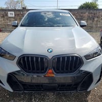 بي ام دبليو اكس٦ • ٢٠٢٦ • كتاب ذوي الشهداء