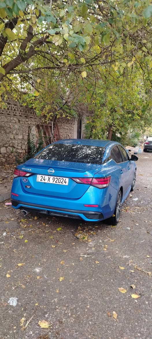 نيسان سينترا 2024 SR أعلى فئة و لون بحري المِميز
عداد المسافة : 20 الف ميل (بحالة الزيرو) 
حجم المحرك : 2000 (4 سلندر)
((((مرقم دهوك    وجاهز))) 

فـــول مـــواصفـــات فول بس بدون فتحه
ضربته:: بس بوند صبخ بدون معجون
ايرباك استيرن راجع اصلي
  
مواصفات 👇🏻
 بصمة ابواب 
بصمة تشغيل 
تشغيل عن بعد 
سستم سماعات  
شحن وايرليس
كاميرا خلفي
اوتو هولد 
اوتو ستارات 
اوتو ستوب 
رادار امامي (فقط يحتاج معايرة)
رادار جانبي  (نقاط عمياء)
رادار خلفي (التحذير من الاصطدام)
حساسات امامي
حساسات جانبي 
حساسات خلفي 
نظام (𝐄𝐂𝐎)
نظام (𝐍𝐎𝐑𝐌𝐀𝐋)
نظام (𝐒𝐏𝐎𝐑𝐓)
كشنات جلد
كشنات كهربائي
كشنات هيتر
تحكمات استيرن
استيرن هيتر
تبريد لمس 
تبريد مركزي 
لايتات ليـــLEDـــد عدسة زينون بيلادي
بكلايتات ايـــLEDـــد بيلادي
السعر 143$و بها مجال قليل
مكان السيارة بعشيقه 

متواجد إتصال هاتف ***********
وتساب ***********.
اسيا
***********
