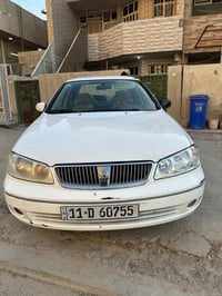 نيسان سني ياباني اصلي 2009 لون ابيض ثلجي محرك جديد مال حاوية اوتماتيك ...
