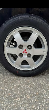 ويل كب اصلي لانسر مع تخم تايرات باله برجستون السعر 250الف مكاني الكرخ ...