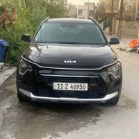 للبيع كيا نيرو 2023 بدون صبغ مكفوله  مكينة 1600هايبرد  رقم بغداد بسمي ...