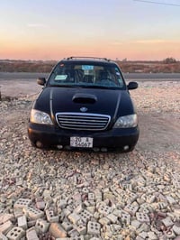كيا كرنفال موديل 2000 محدثه 2005 رقم دولي محرك جديد تبريد شغال ثلج ثلا...