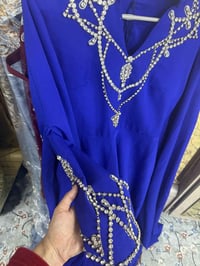 فستان • قياس ٤٢ • ملبوس مرة