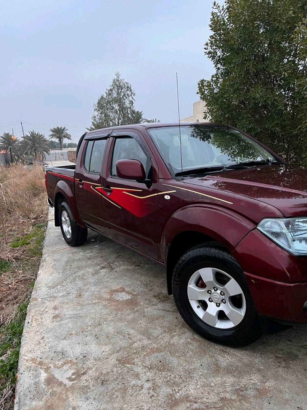 السلام عليكم نيسان نافارا ديزل كاز مكفوله موديل 2013بأسمي رقم اربيل الدولي 4x4 نفخ تبريد ثلج تخم تاير صدرهه جديد لون الداخل عسلي شاشه كامره خلفيه السيارة جاهزه للأستفسار ***********