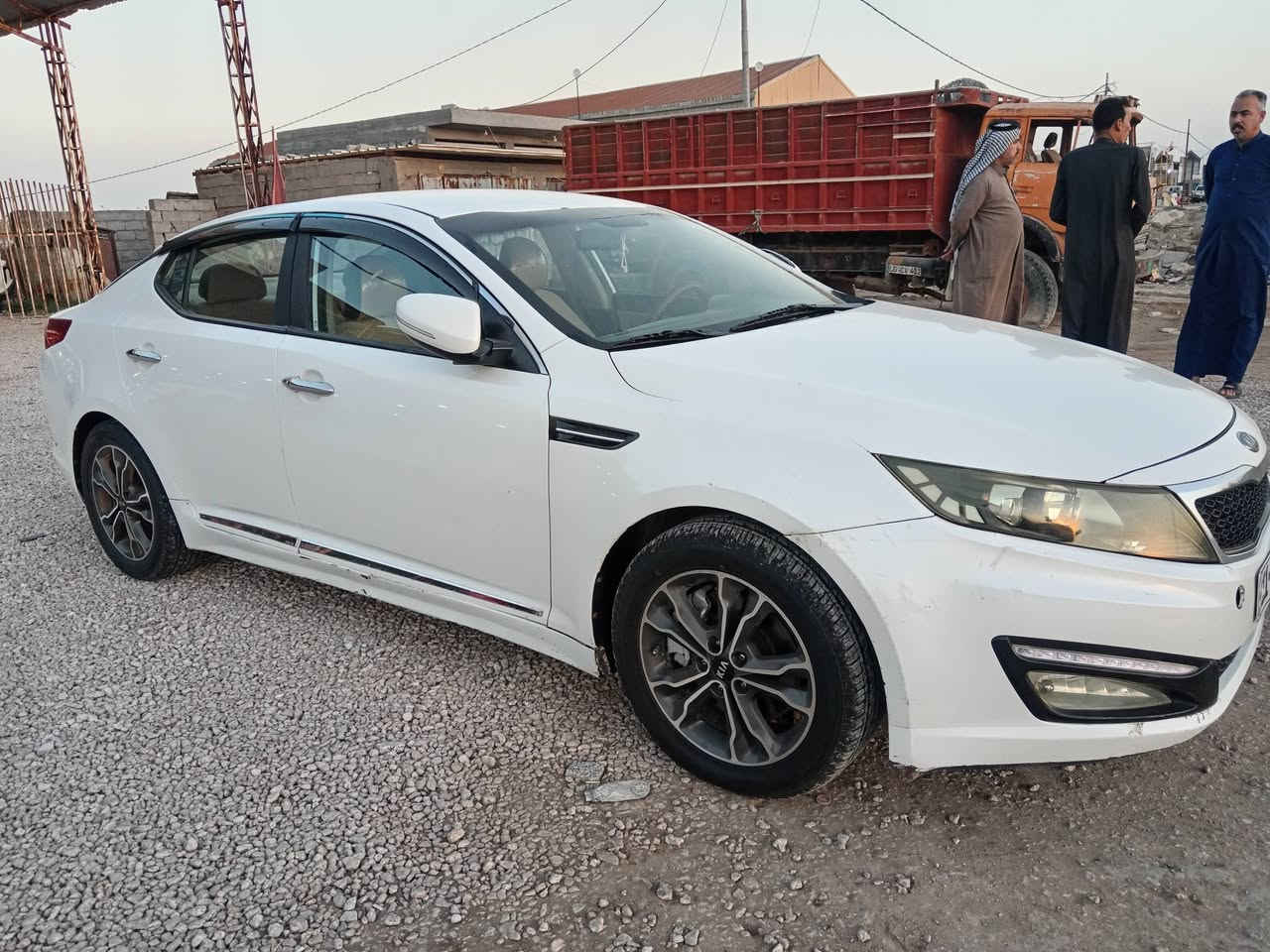 كيا اوبتيما خليجي موديل ٢٠١٢ محرك ٢٤٠٠ جديد حداديه جديده تبريد ثلج رقم بغداد دولي بأسمي مواصفات السيارة  بصمة تشغيل تحكم استيرن شاشه وكامره مري شفط إشارة بالمري تبريد قطعتين السيارة بيها جاملغ امامي تبديل اصلي بدون عابر السعر النهائي ١٣٥ ورقة نقد أو مراوس مكان السيارة السماوه الرميثه للاتصال *********** او ***********
