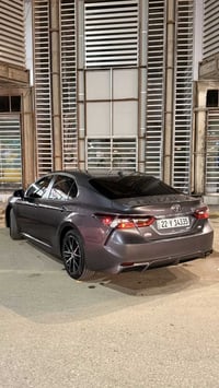 كامري وارد امريكي موديل 2023 SE  رقم اربيل  ماشي 95 الف  داخل لونين  م...