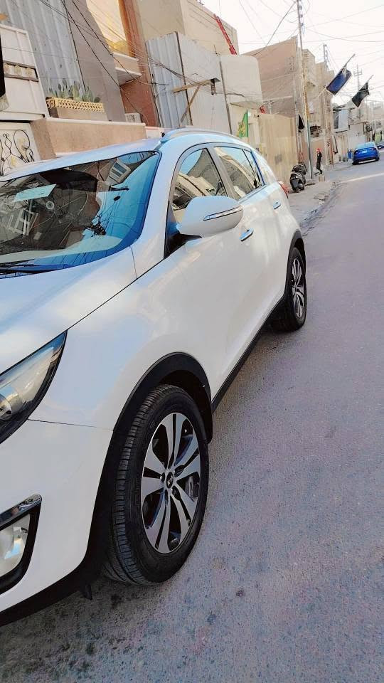 سبورتج ٢٠١٢ للبيع خليجي رقم بغداد انكليزي سياره نظيفه كله جاهزه بيه فقط بارد لا ضربه ولا صبغ مكاني بغداد *********** السعر ١٣٠ بغداد, العراق
