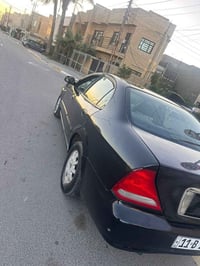 موديل 2006 رقم بغداد الدولي  مصبوغه عام جماليه  كير ومحرك خير من الله ...