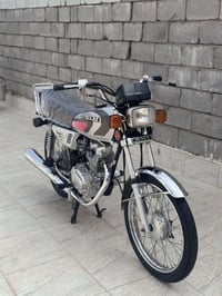 ‏دراجة طالعة من الوكيل 23 دراجة كرتون أصلي ￼ أو راق وصولي ما مفتوحة ال...