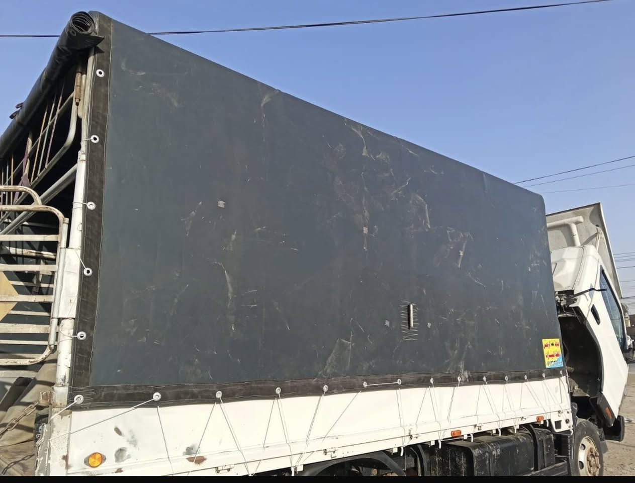 عمل چوادر سيارات الحمل العنوان بغداد ***********
