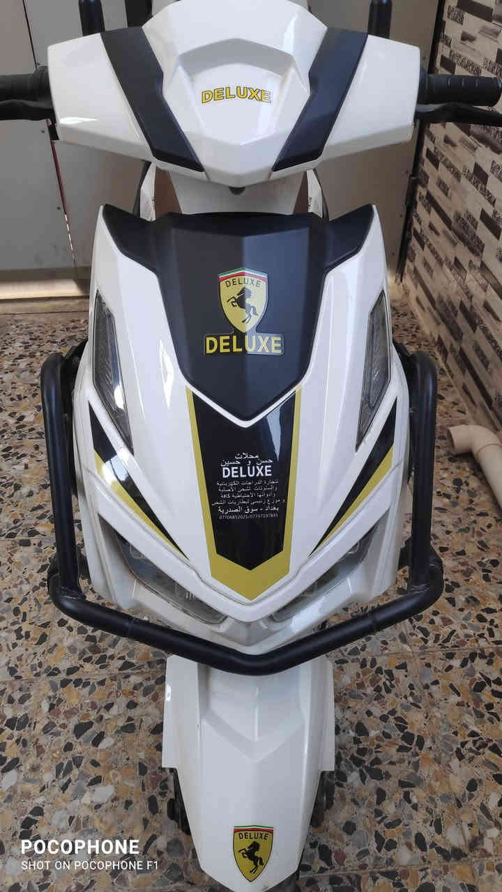 دراجة شحن نوع سكنس استيراد محلات حسن وحسين ديلوكس (حجم الملف 2500 واط ) ( عدد الباتريات 7 الحجم الكبير 38 امبير ) بريكات دسكات امامي وخلفي وبيه نظام ( ABS ) مانع انزلاق ( بيه 4 نمر للسرعه وبيه بك مع مثبت سرعه ) ( اشاير بالمري مع امبي ثري بلوتوث ) ( بصمة تشغيل  مع كارت تشغيل مع مفتاح تشغيل ) دراجة حلوة ونظيفه مامتعوبه مكاني بغداد العبيدي هاتف (  *********** ) سعر مليون وميه وبيه مجال حك الجيه
