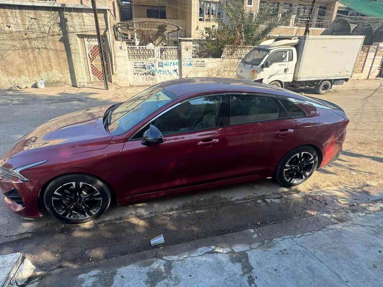 ‏K5  مواصفات جيتي لاين 
موديل 2022 رقم اربيل  وكال او تحويل مضمون 
محرك 1600 تيربو 
اللون احمر
1-بصمه + تشغيل عن بعد 
2-شحن هاتف لاسلكي 
3- قياده ذاتيه ؏ الخطوط السريعه
4- هاند بريك بصمه 
6- مثبت سرعه 
7- اوتو بربك
8- سستم سماعات  Bose 
9-حساس أطارات 
10-بك لايت ليد كامل متصل 
11-شاشة كبيره Gps
12- كامره دواره + حساس خلفي 
13- كير أوتو + عادي
14-شاشه اعطال
15-ويل كورم لونين
16-رادار جانبيه
17-مراقبة النقطة العمياء
18-فول تحكم ستيرن  
19-اشاير بالمري 
21-كشنات جلد اسود 
22-‏ كراسي الامامي كهرباء 
23-لايتات عدسات + لد اصفر
24-نضام قياده أيكو + سبورت +سمارت +نورمال

السعر158وبيهه  مجال قليل 

السياره وارد امريكي حادثها بارد شوي ونص جاملغات خلفيه صبغ  بدون ايرباكات 
رابط الحادث :- https://bid.cars/en/lot/0-38850848/2022-KIA-K5-5XXG64J2XNG129664
ماشيه ١٨٠   الف                                                                         المكان بغداد المشتل 
رقم الهاتف *********** بغداد, العراق
