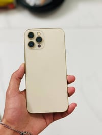 ايفون 12 برو ماكس ذهبي للبيع . ماستر عربي شرق اوسط  ذاكرة 128 گيگه الب...