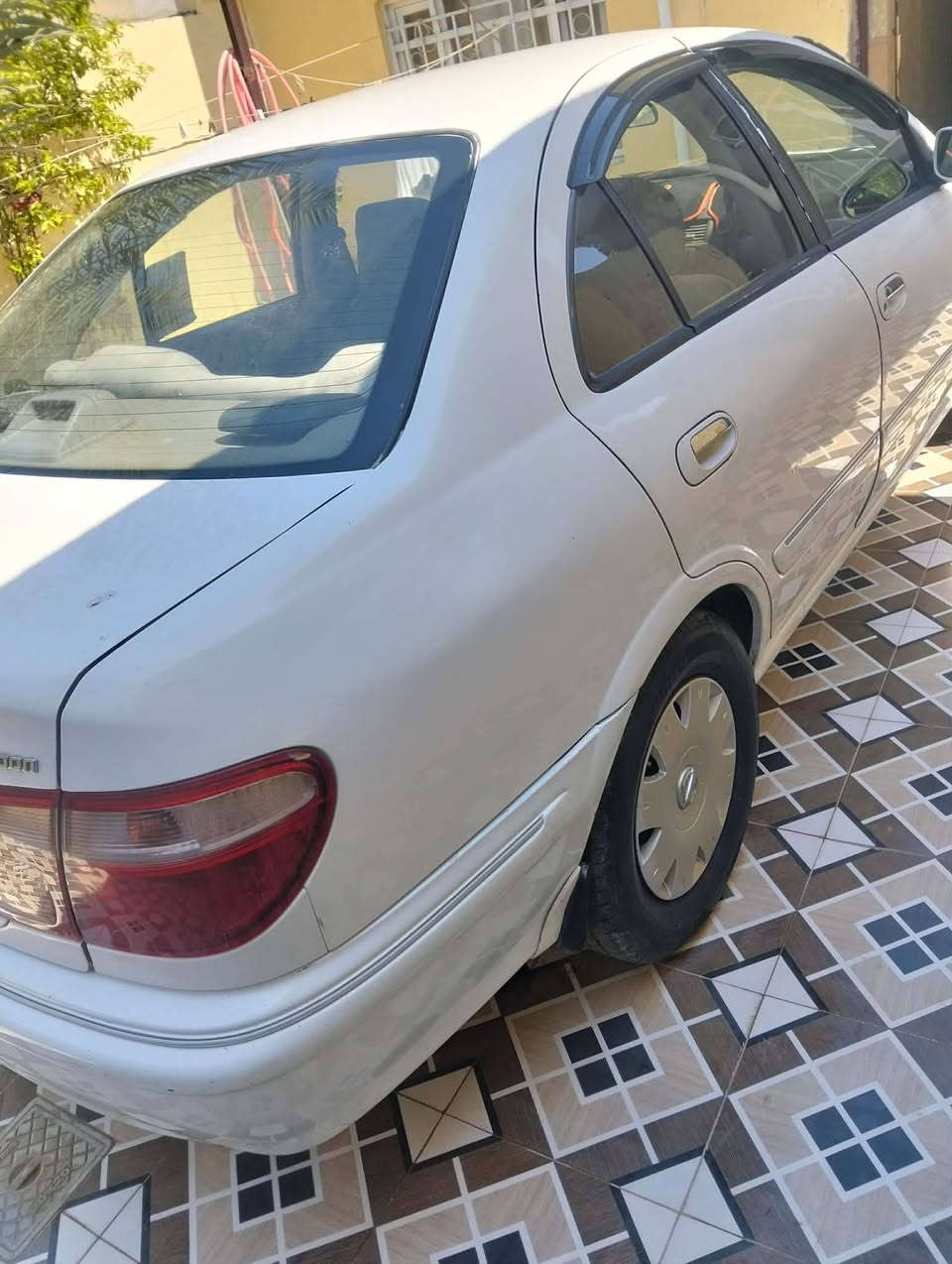 نيسان سني ياباني اللبيع ٢٠٠٢ كير عادي تبريد شغال رقم بغداد كير محرك نضيف السعر ٦٨ بي مجال تلفون ***********
