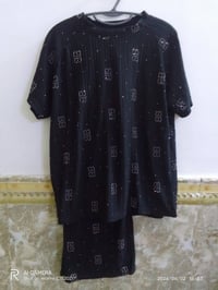 قطعة • ملابس