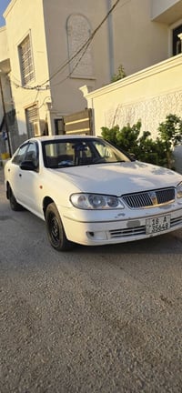 سيارة نيسان سني 2009 ياباني قبق ابيض  1مكينه 1800 2 كير لوك 3 تبريد تد...