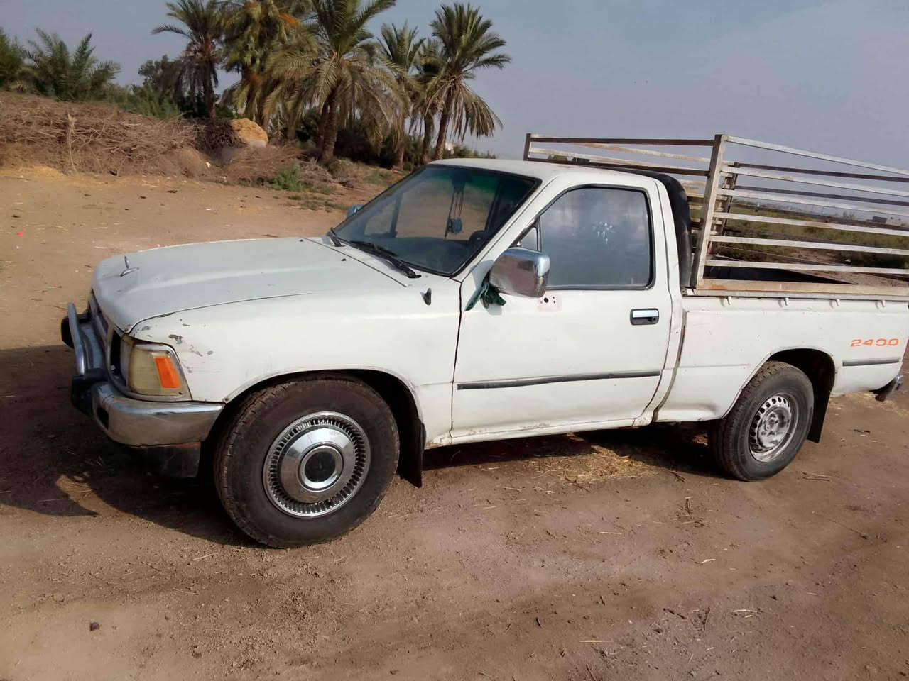 السلام عليكم سيارة تويوتا موديل 94 تخم تاير جديد سنوية 29 مكينة كروسيدة قطرة ماتقص كير مال جمرة حدادية نص عمر سيارة مكفولة من الصبق الگلبة رقم إنكليزي سعرها 40وبيها مجال العنوان ناصرية مفرق سيد يوشع قضاء الإصلاح للاستفسا***********..
