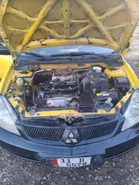 لانسر 2010 • رقم بغداد • باسمي