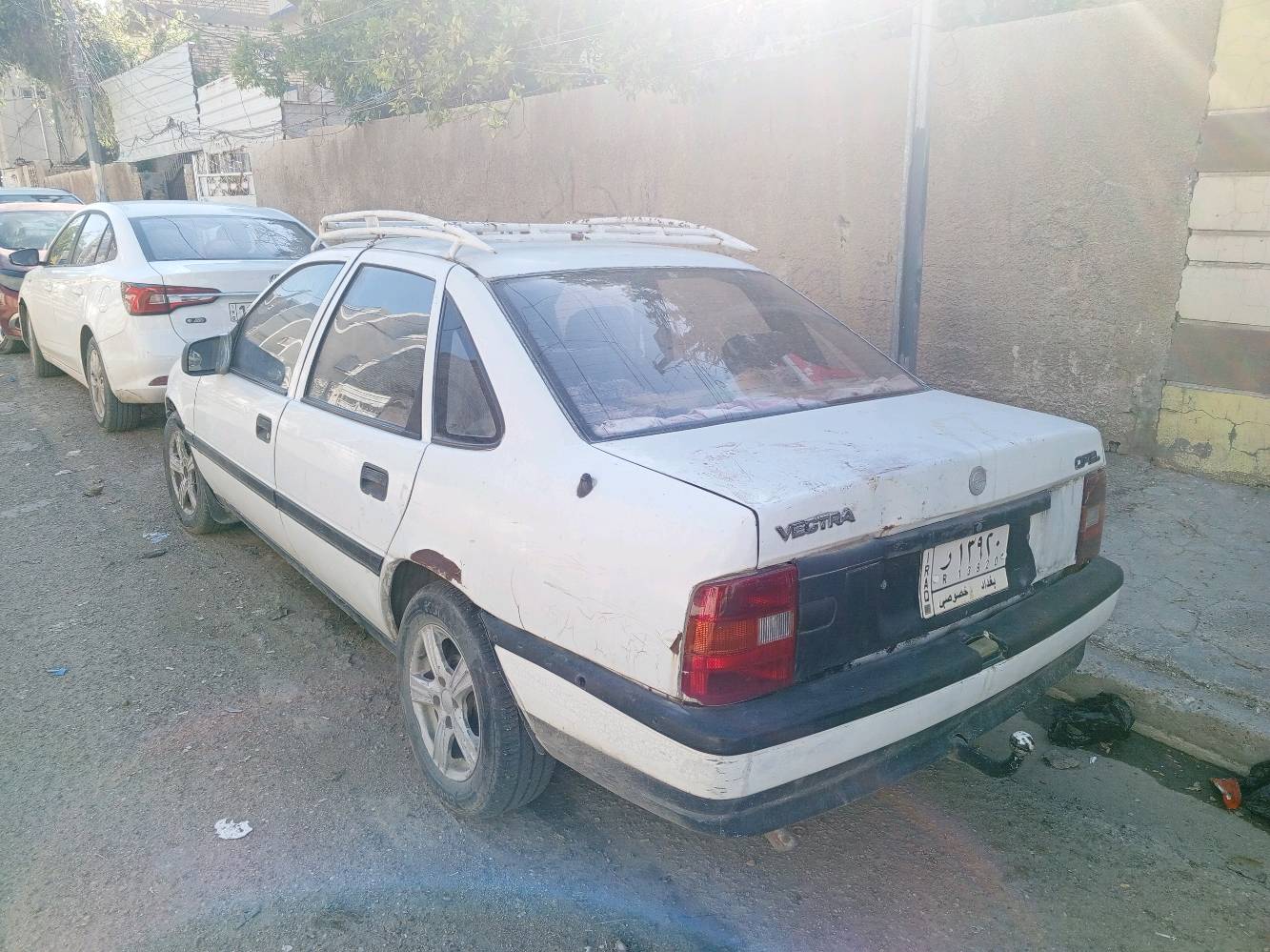 أوبل فكترا كير عادي بغداد باسمي سنويه بدون تبريد موديل 1990 مشروع وطني السعر 30ورقه العنوان بغداد الكاظميه الدولعي