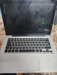 لابتوب ماك بوك عطلانه للبيع تفيد المصلحين و اصحاب مجال الصيانه و نقص ب...