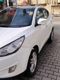 توسان ٢٠١١ • مكينة ٢٤٠٠ • نجف انكليزي