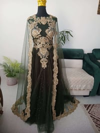 فساتين فخمة • زيتوني غامق • لحد ٦٠/٧٠كغ