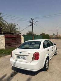 اوبترا 2008 لون ابيض رقم بغداد انكليزي هزه ورقم جديد بسمي تحويل ثاني ي...