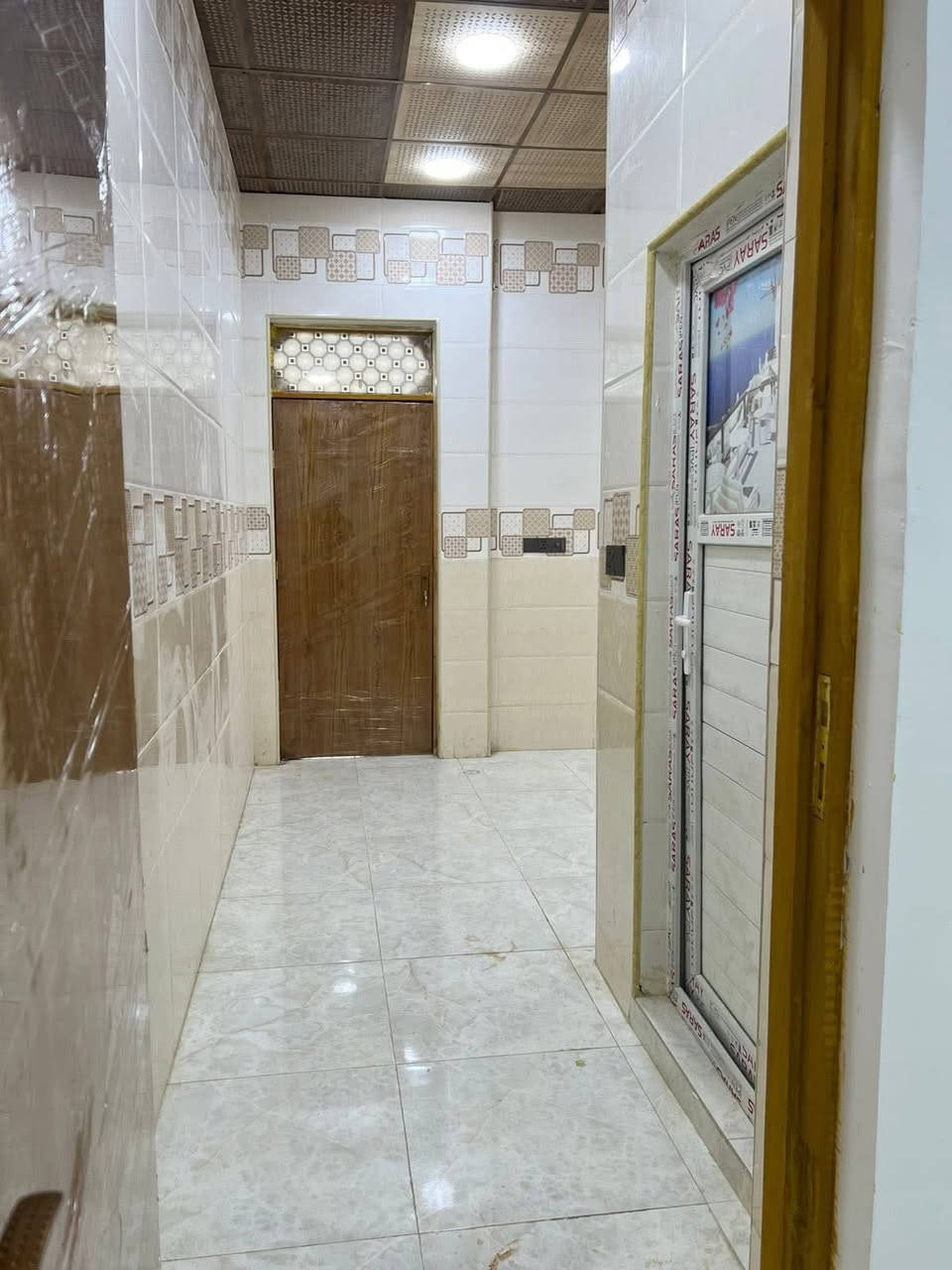 سلام عليكم منزل 🏠 مساحة 100 مترفي حي نداء منطقه 58 خلف شارع 60رقم العقار 58290 سند بأسمي المنزل الاساس  كونكريت والسقف كونكريت طابوك نهروان السطح شتايكر سيراميك هندي تأسيس الكهرباء وماء درجه أولى شغل جناي يتكون من غرفه ومطبخ وصاله واستقبال سند طابو صرف بأسمي للاستفسار ***********@إشارة
