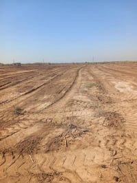 ارض زراعية • ٩ دونم • مقابل بانزين خانه الغياث