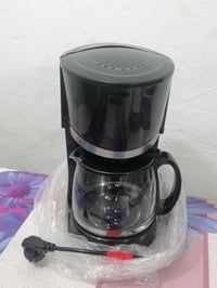 مكينة قهوة او شاي • جديدة ما مستخدمة • بالكارتون