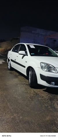 كيا بريد 2009 فول مري شفط محرك 16 نضافه رقم نينوئ  السياره بسمي  طخم و...