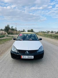 لانسر ٢٠١٠ • مكينة ١٦٠٠ • رقم ديالى