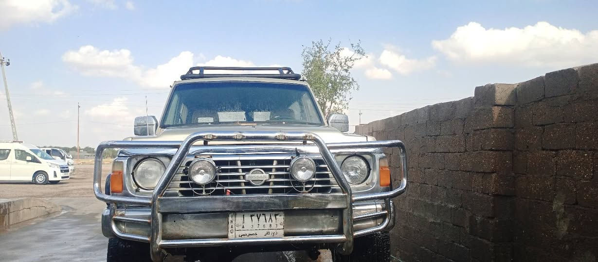 السلام عليكم نيسان باترول ربع للبيع موديل 1992 رقم ذي قار تحويل السياره تعمير جديد من سمكره وصبغ وتخم تاير ودوشمه السياره الفور ويل شغال مكينه 4200 بيه صوت كوجم بيم السعر 55 وبيه مجال رقم الهاتف *********** مكان السياره ديالى
