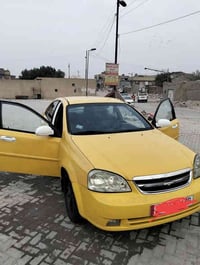 أوبترا موديل 14 رقم بغداد سياره ليبل واحد بيه جاملغ خلفي بي تعمير بسيط...