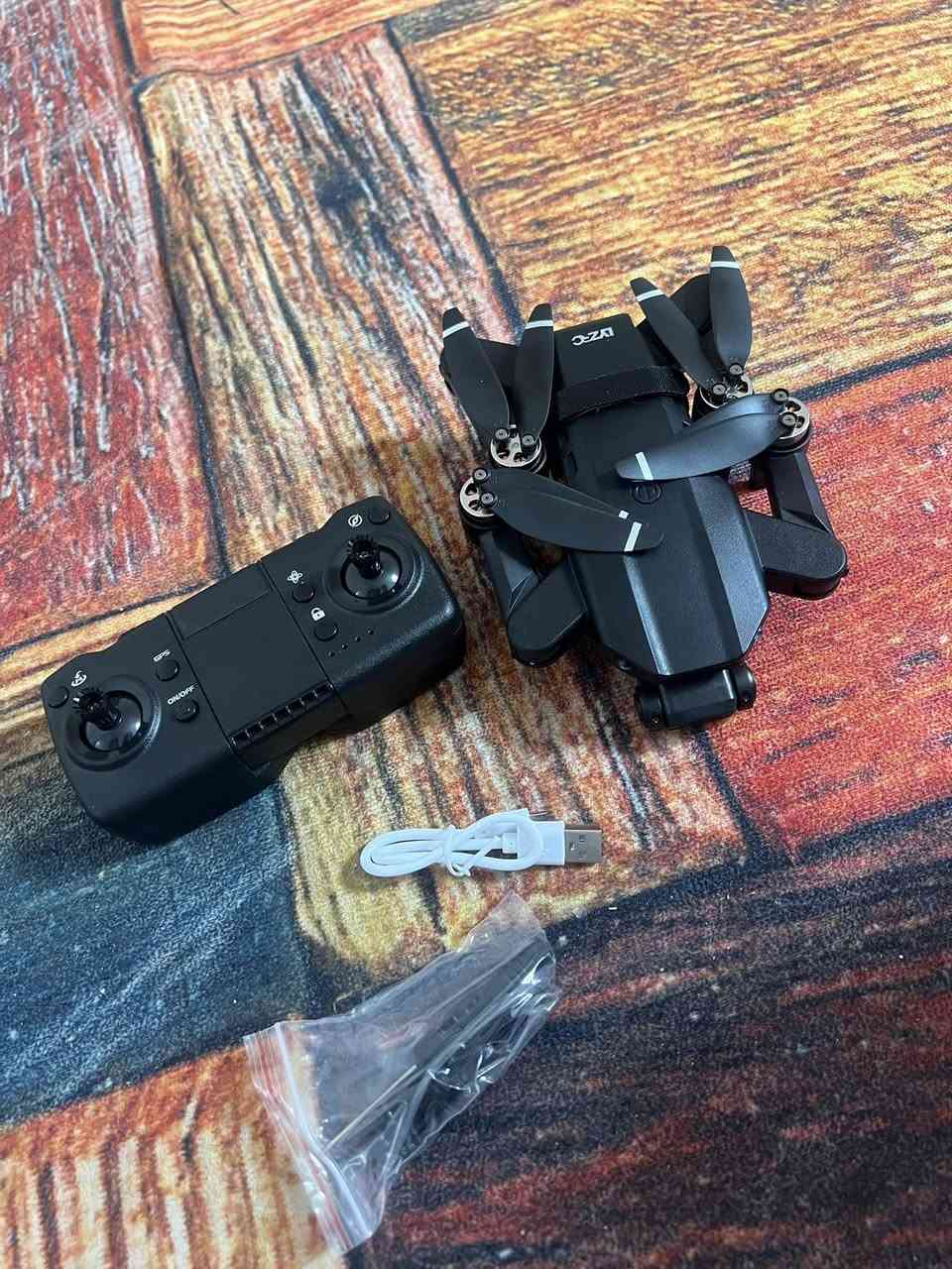 L900 برو خبصتوني عليه
جديده كبس مواصفات 
كاميرا احترافية بدقة 4K (كاميرا أمامية + كاميرا سفلية) لصور وفيديو
____________
S + 5G Wi-Fi FPV: gbsتحديد الموقع بدقة وبث مباشر للصورة على الهاتف أو شاشة 
التحكم.
___________
أوضاع ذكية مثل العودة التلقائية (Return-to-Home)، تتبع الهدف (Follow Me)، طيران بنقاط محددة
__________
مدة طيران حوالي 25-28 دقيقة لكل بطارية. 
سعر 60 الف يتوفر توصيل مكاني كوت 
***********
