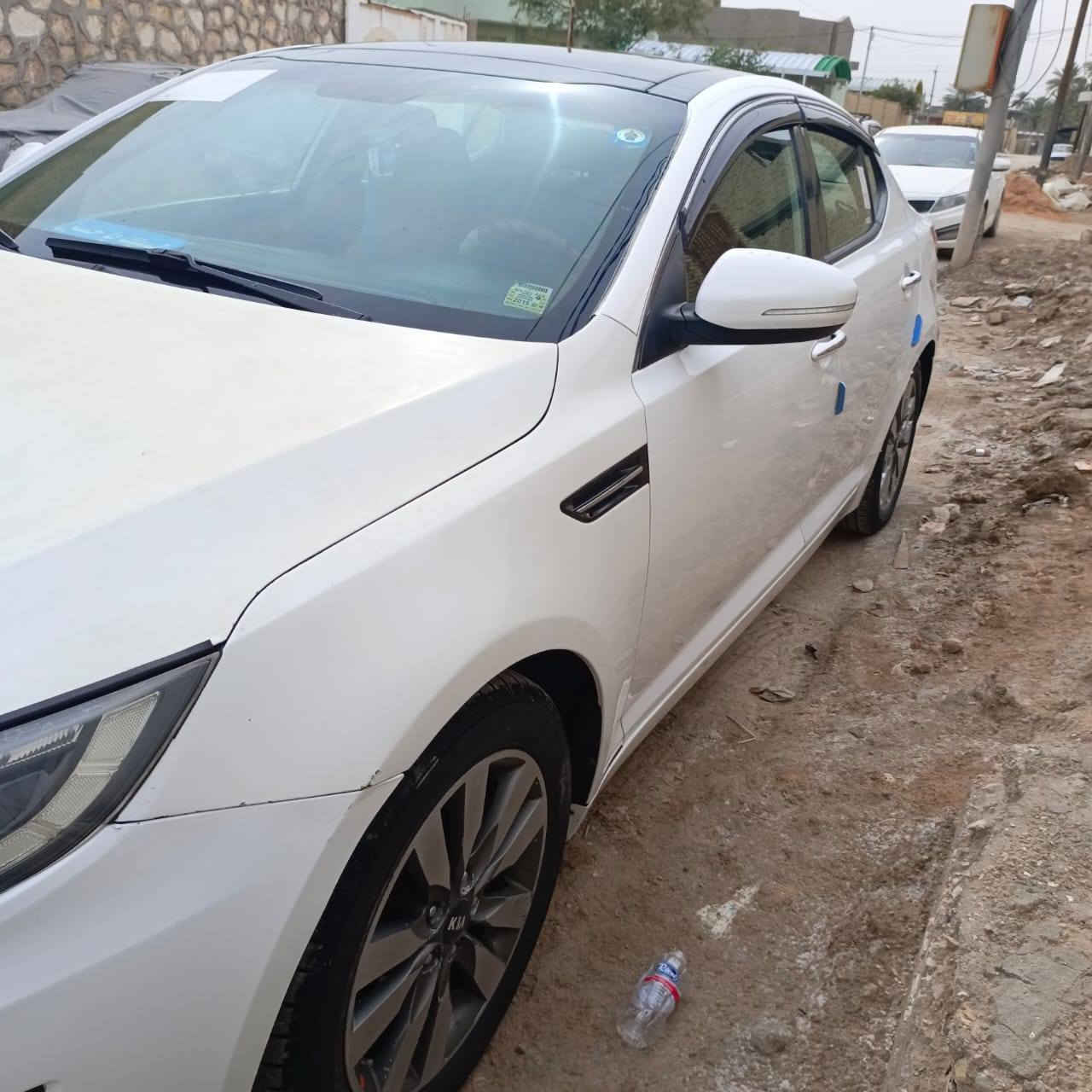 السلام عليكم... 
 كيا اوبتما  2013 ... (وارد امريكي ) 
(رقم بابل) دولي الجديد باسمي 
فول مواصفات كشنات جلد 
السايق والراكب كهربائي
تدفئة تبريد الكشنات الخلفيه تدفئه
 المري شفط 
شاشه كبيره  كامره  فول 
بانوراما 
كير و  محرك  2400 مكفول 
بيها جراد قطع بسيطه موضحه بلصوره
مكان السياره (الديوانية.. قضاء الشاميه) 
هذا رقمي ***********
 تصل وبيك خير وتدلل
