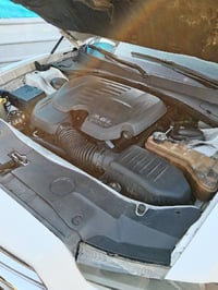 بدون تبديل لون ابيض بيه بارد ١٣ أربيل وربع الباب الخلفي صبغ   مكانه بغ...