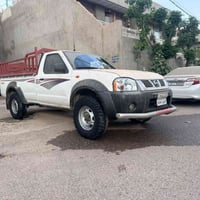 نیسان پیکاب٢٠٠٧ دو پارجە بۆیاخ تەحویل و غرامە بەشەرت سعر١١٨و معامەلە07...