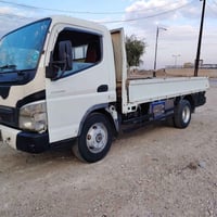 كنتر ميتسوبيشي • مديل 2009 • كفالة عامة