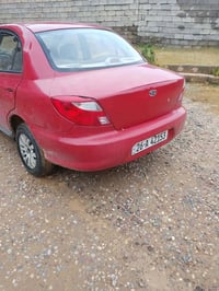 سياره للبيع كيا ريو 2001 رقم دولي لل28 صبغ جماليه محرك نضيف  كير عادي ...