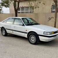 MAZDA 626 هاج باك (جنطه) 8وبخ كير عادي سياره خير من الله حداديه كله اب...