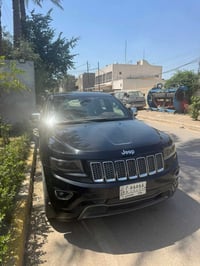 كراند شيروكي • ٢٠١٤ • لمتد جلد