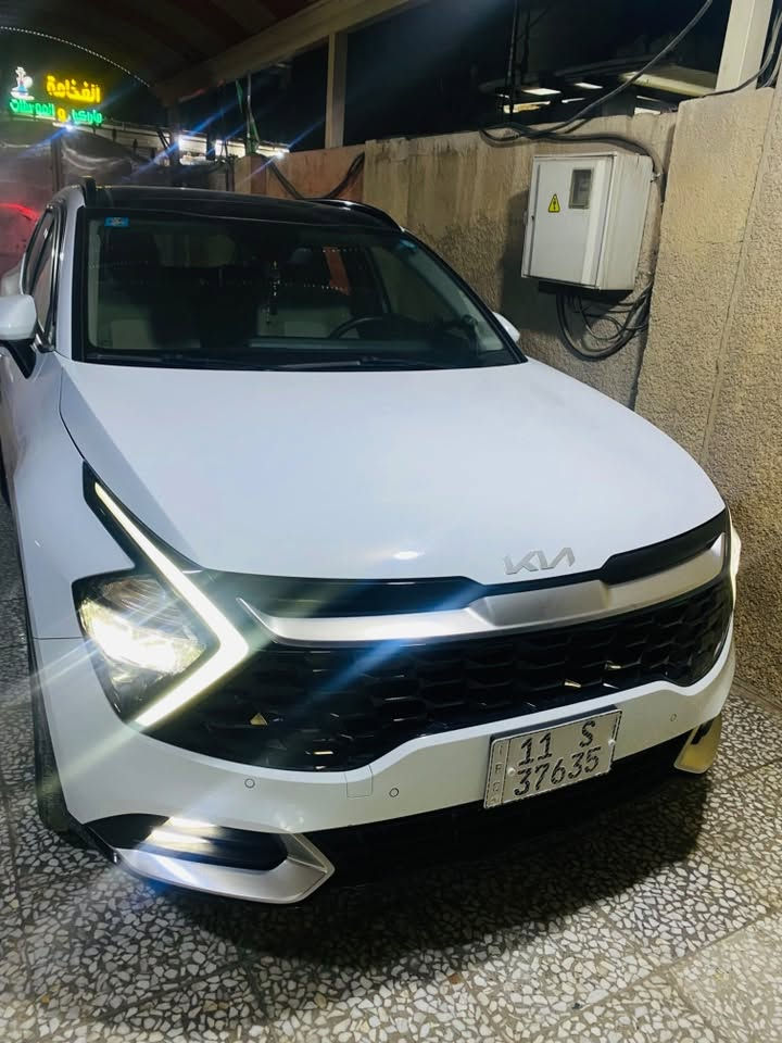 ⸻
السلام عليكم 

🚘 للبيع كيا سبورتج خليجي 2023

📍 رقم بغداد الجديد – السيارة باسمي 
هزة جديدة 

المواصفات:
✅ سقف بانوراما
✅ بصمة تشغيل وبصمة أبواب
✅ تشغيل عن بُعد
✅ شاشة Apple CarPlay
✅ كاميرا خلفية
✅ كشنات كهربائية مع تدفئة
✅ تبريد قطعتين
✅ رادار جانبي
✅ حساسات أمامية وخلفية
✅ هند بريك إلكتروني (بصمة)

ملاحظة:
🔹 السيارة بيها بارد بسيط كلش بل باب موضح بل صور 

💰 السعر المطلوب:205$ والشراي ما ارجعة 
📞 للاستفسار: ***********

📍 العنوان: بغداد – الكمالية
