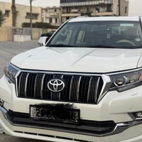 برادوTXL  موديل 2021   شاشة وكالة مشدودلها مال VX  كشنات تغليف جلد   و...