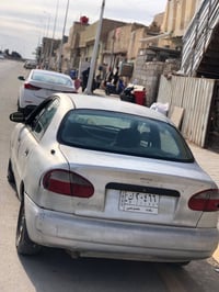 دايو لانوس موديل 1999 مكينه نضيفه حداديه جديده رقم بغداد  السعر ٢٥وبيه...