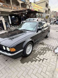 بي إم دبليو ٧٣٠ • موديل ١٩٩١ • كشنات جلد فتحة