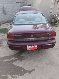 للبيع سوناته مديل ٢٠٠ محرك ٢٠٠رقم بغداد مشروع وطني  بسمي  تحويل ثانيوم...