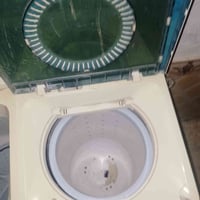 غساله للبيع شغاله كلشي مابيه بس التجفيف عوزه دهن كاضه بسعر مناسب 07824...