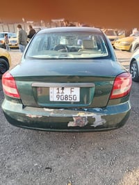 كيه ريو اوتماتيك موديل2003رقم بغداد 38وبيهه مجال باقي التفاصيل ع رقم 0...