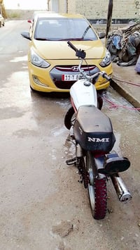 دراجه ايرانيه • مكينه جديده • بغداد الجزيرة السياحيه